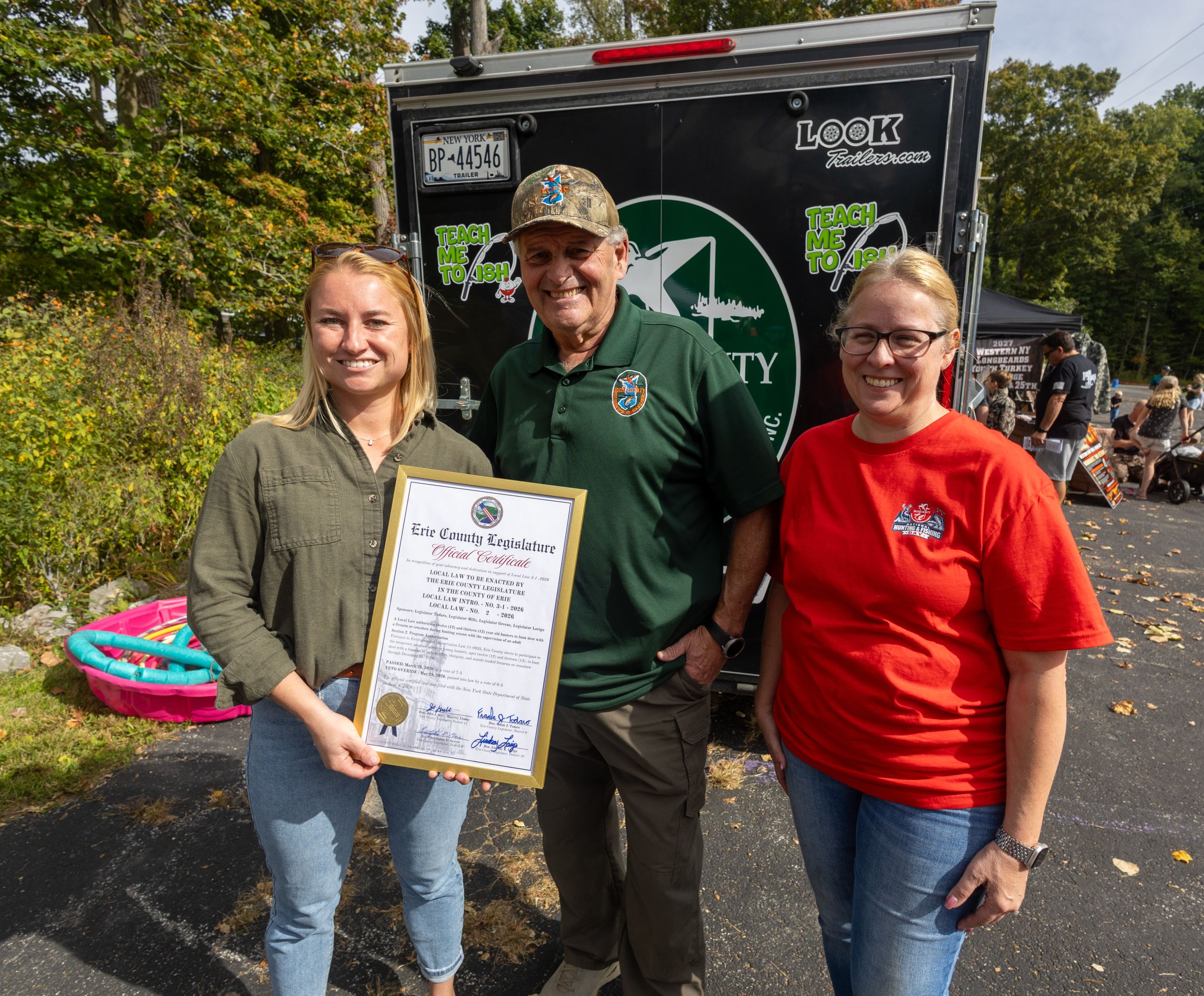 2026Sept26-103 NYS Assembly Woman Lindsay Lorigo presented ECFSC President Jack Coad and NHFD Chairman Diane Steel with an official copy of the law allowing 12 year olds to hunt big game.